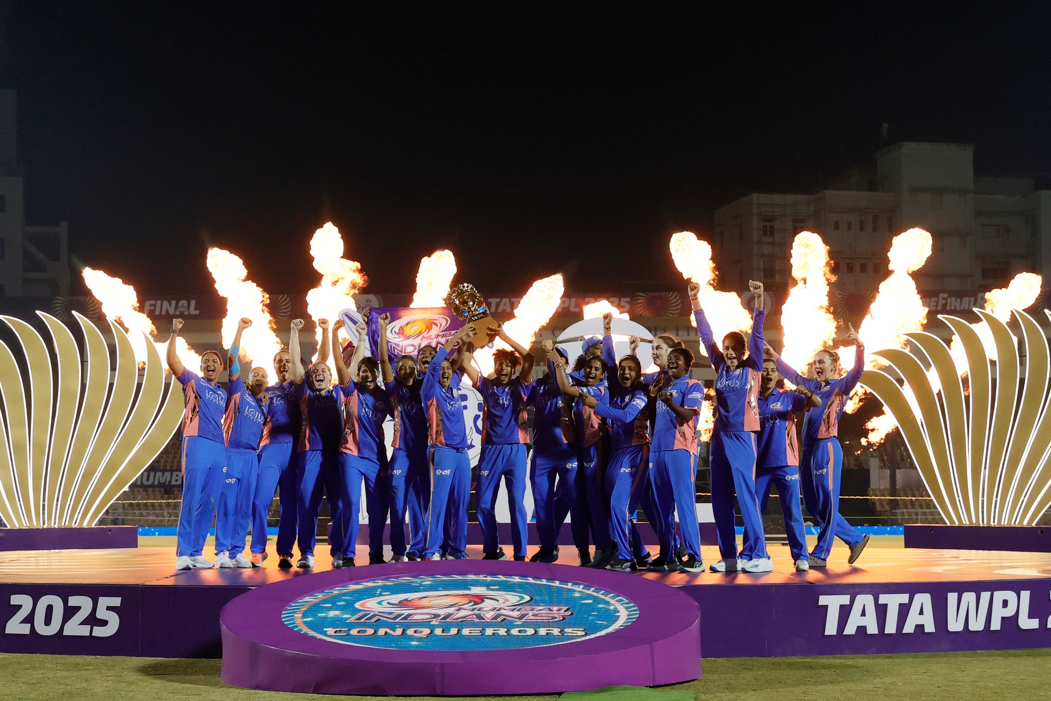 Mumbai Indians players pose for picture with trophy during final match of the Women&#039;s Premier League 2025 (WPL) between the Delhi Capitals and the Mumbai Indians held at the Brabourne Stadium, Mumbai, India on the 15th March 2025

Photo by; Arjun Singh / Sportzpics for WPL