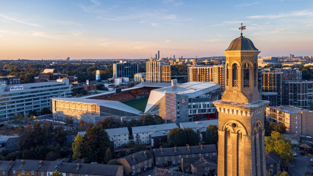 London, United Kingdom – August 07, 2022: An aerial view of Gtech Community Stadium at sunset. London, UK