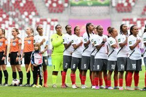 LODZ, POLAND - SEPTEMBER 13: Players of New Caledonia line up as they sing the national anthem before the FIFA U-20 Women's World Cup Group Stage match between Nigeria and New Caledonia at Stadion Miejski on September 13, 2026 in Lodz, Poland. (Photo by Mateusz Slodkowski - FIFA/FIFA via Getty Images)